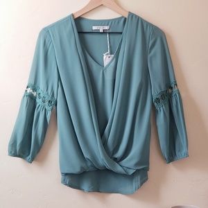 NWT Naked Zebra faux wrap blouse (S)